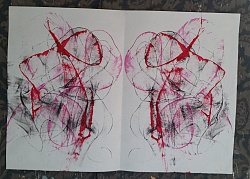 Ein Bild mit einem Fadenbild in rot und grau. 