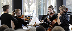 Das Bild zeigt ein Streichquartett mit jugendlichen Musikern im Audi-Hangar. Zusätzlich sind die Köpfe der Zuhörer zu sehen. 