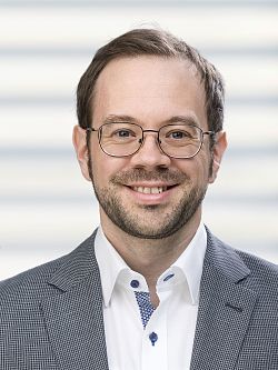 Portraifoto von Nicolas Scherger, Leiter Kommunikation und Pressearbeit